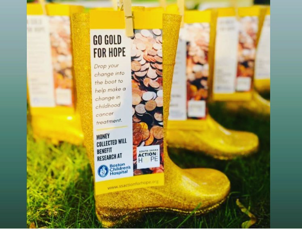Gold boot used to collect change for pediatric cancer fundraising