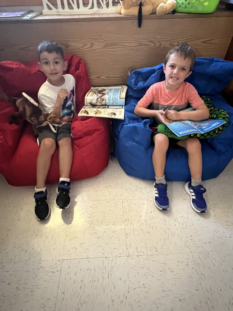 Kindergarteners reading together.